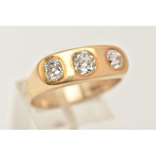 6 - A YELLOW METAL THREE STONE DIAMOND RING, three old mine cut diamonds, approximate total diamond weig... 