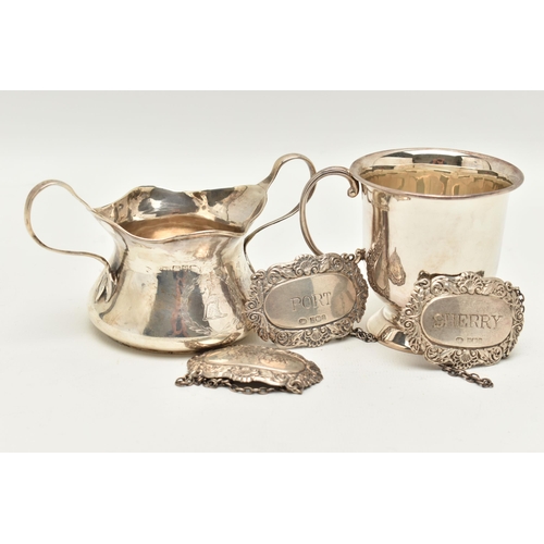 67 - A SILVER SUGAR BOWL, CUP AND THREE DECANTER LABELS, the polished sugar bowl, fitted with double hand... 