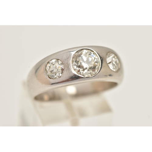 7 - A WHITE METAL THREE STONE DIAMOND RING, three old cut diamonds, estimated total diamond weight 1.90c... 