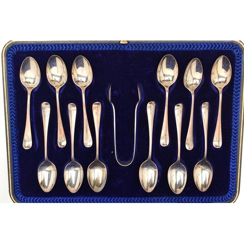 73 - A CASED SET OF EDWARDIAN SILVER TEASPOONS, including twelve rat tail teaspoons, with engraved initia... 