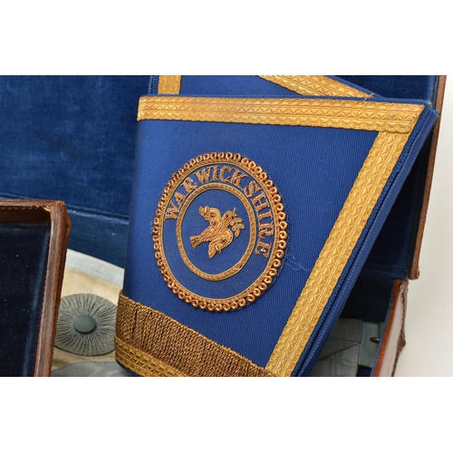 101 - THREE BRIEFCASES OF MASONIC REGALIA, to include a silver gilt and light blue guilloche enamel 'Lodge... 