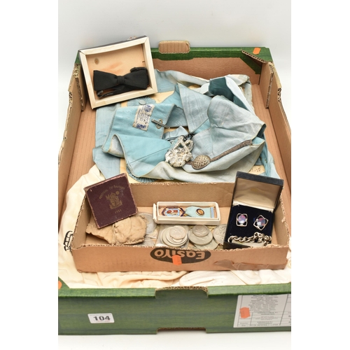 104 - A BOX OF ASSORTED MASONIC REGALIA, to include an apron, a sash, gloves and a medal, also including a... 