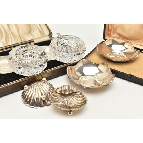 79 - THREE CASED SETS OF SILVER ITEMS, to include a two piece set of shell shape salts with spoons, hallm... 