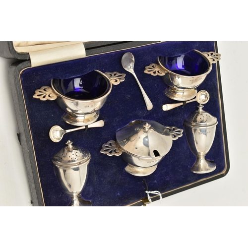 80 - A 'GEORGE UNITE' SILVER CRUET SET, comprising of two salts and a mustard all with blue glass inserts... 