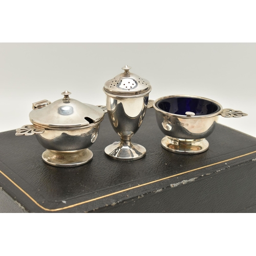 80 - A 'GEORGE UNITE' SILVER CRUET SET, comprising of two salts and a mustard all with blue glass inserts... 