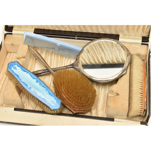 81 - A CASED SILVER AND BLUE GUILLOCHE ENAMEL VANITY SET, comprising of a hand held mirror, hair brush, t... 