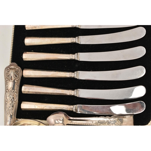 82 - A SELECTION OF SILVER CUTLERY, to include a Georgian fiddle pattern ladle, engraved crest to the ter... 