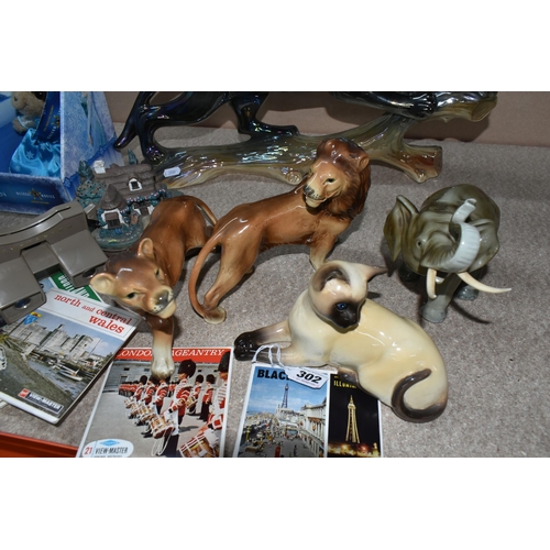 302 - A COLLECTION OF ANIMAL FIGURINES, COLLECTABLE MEERKAT FIGURES, AND A VINTAGE VIEWMASTER, comprising ... 