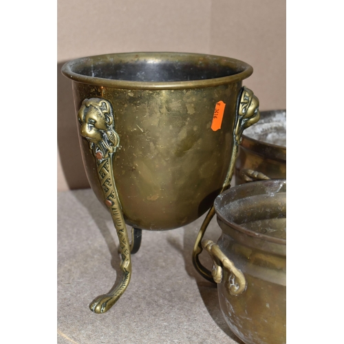 303 - A GROUP OF THIRTEEN COPPER AND BRASS MISCELLANEOUS ITEMS to include four brass footed planters to in... 