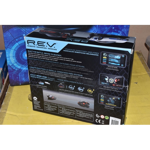 312 - THREE BOXED GAMES, to include a Wowee BNIB R.E.V Enhanced Vehicles Battle Pack Bluetooth smart, no 0... 