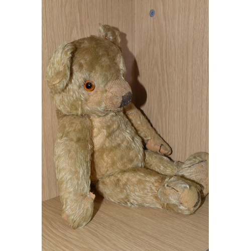 317 - A 1930'S MERRYTHOUGHT GOLDEN PLUSH TEDDY BEAR, one amber and black glass eye (other missing), shaved... 