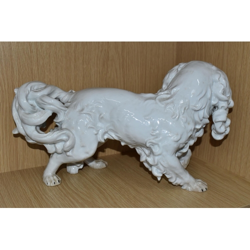 318 - A DRESDEN PORCELAIN PEKINGESE DOG FIGURE, possibly Carl Thieme, puce D backstamp, height 20.5cm x le... 