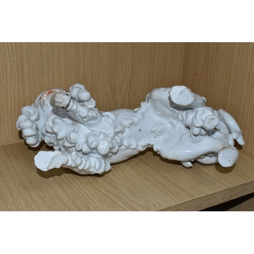 318 - A DRESDEN PORCELAIN PEKINGESE DOG FIGURE, possibly Carl Thieme, puce D backstamp, height 20.5cm x le... 