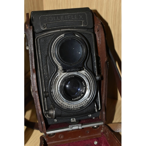 319 - TWO VINTAGE TWIN LENS CAMERAS, comprising a Yashica-A  serial No. A 8020081, with brown leather case... 