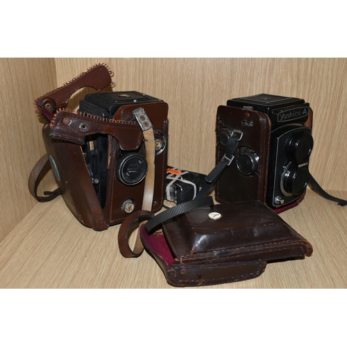 319 - TWO VINTAGE TWIN LENS CAMERAS, comprising a Yashica-A  serial No. A 8020081, with brown leather case... 