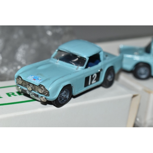 329 - FOUR CONSTRUCTED K & R REPLICAS TRIUMPH TR4 SPORTS CAR MODEL KITS, all 1/43 scale white metal kits t... 