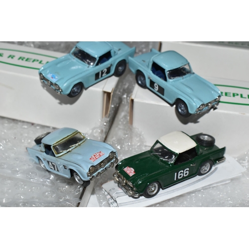 329 - FOUR CONSTRUCTED K & R REPLICAS TRIUMPH TR4 SPORTS CAR MODEL KITS, all 1/43 scale white metal kits t... 