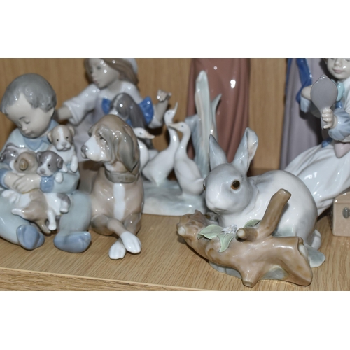 336 - A GROUP OF SIX LLADRO FIGURES AND ONE NAO FIGURE, comprising Trying on a Straw Hat, model no 5011, s... 