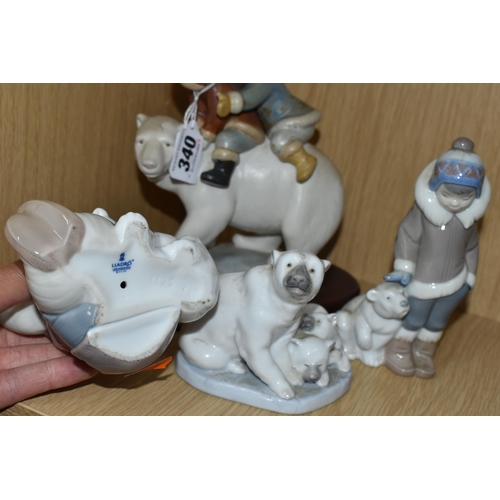 340 - A GROUP OF FOUR LLADRO FIGURES, comprising a Lladro Grés Eskimo riders, model no 2270 with wooden pl... 