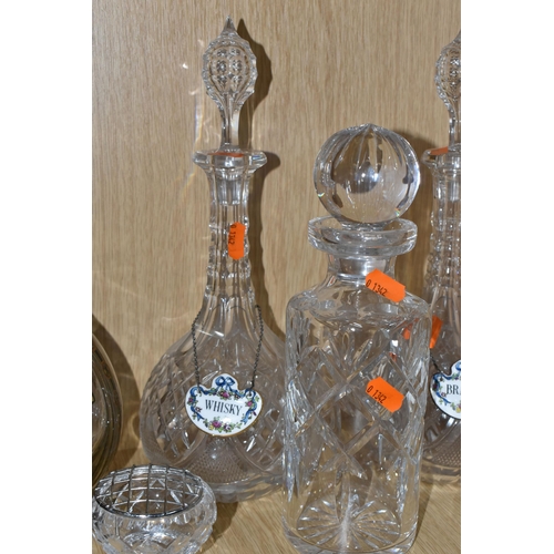 341 - A GROUP OF SIX CUT CRYSTAL AND TWO ADVERTISING DECANTERS, comprising two Victorian cut crystal decan... 