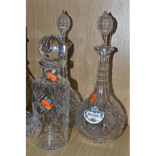 341 - A GROUP OF SIX CUT CRYSTAL AND TWO ADVERTISING DECANTERS, comprising two Victorian cut crystal decan... 