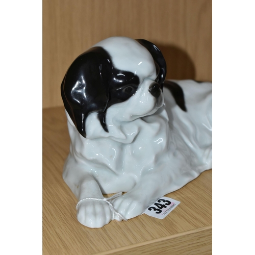 343 - A ROSENTHAL RECUMBANT JAPANESE CHIN DOG, incised mars to the base Max Valentin 9419, length 28cm x w... 