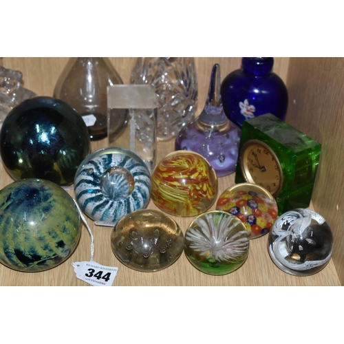 344 - A LARGE QUANTITY OF GLASS PAPERWEIGHTS AND GLASS ORNAMENTS, comprising a 1920's Uranium glass table ... 