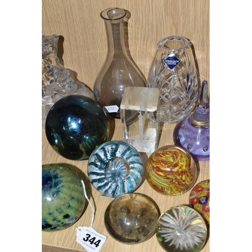 344 - A LARGE QUANTITY OF GLASS PAPERWEIGHTS AND GLASS ORNAMENTS, comprising a 1920's Uranium glass table ... 