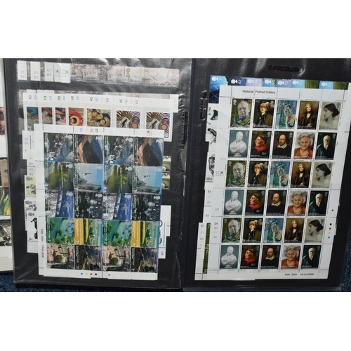 347 - THREE ALBUMS WITH GB DUPLICATED STOCK OF COMMEMORATIVES FROM 1978-MID 2010S, usually as blocks or pa... 