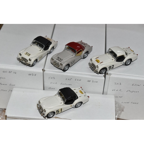 350 - FOUR CONSTRUCTED K & R REPLICAS TRIUMPH TR3 SPORTS CAR MODEL KITS, all 1/43 white metal kits that ha... 