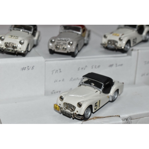 350 - FOUR CONSTRUCTED K & R REPLICAS TRIUMPH TR3 SPORTS CAR MODEL KITS, all 1/43 white metal kits that ha... 