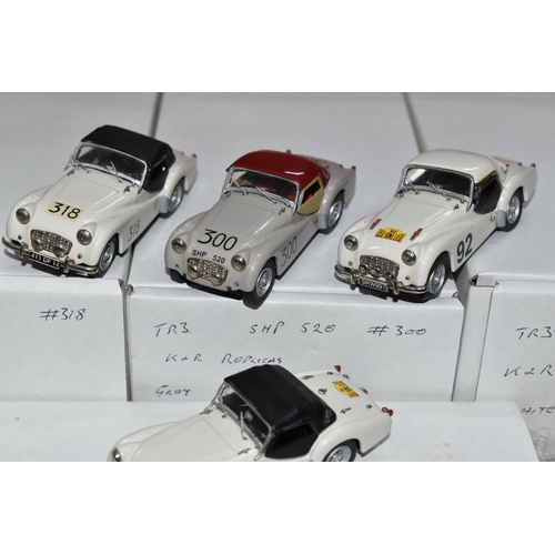 350 - FOUR CONSTRUCTED K & R REPLICAS TRIUMPH TR3 SPORTS CAR MODEL KITS, all 1/43 white metal kits that ha... 