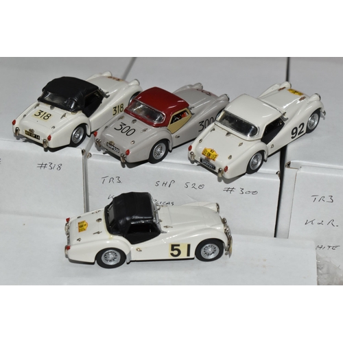 350 - FOUR CONSTRUCTED K & R REPLICAS TRIUMPH TR3 SPORTS CAR MODEL KITS, all 1/43 white metal kits that ha... 