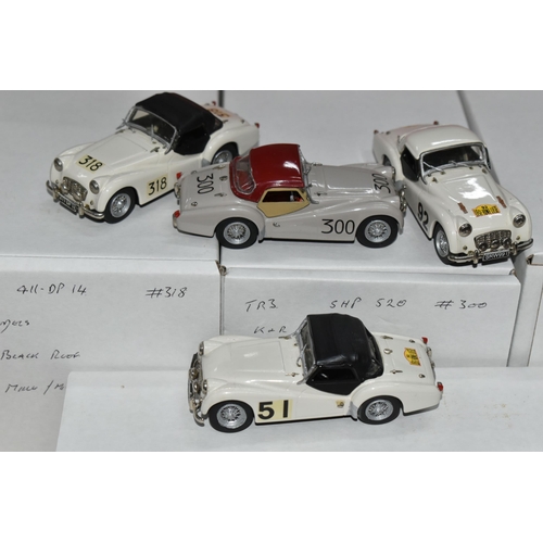 350 - FOUR CONSTRUCTED K & R REPLICAS TRIUMPH TR3 SPORTS CAR MODEL KITS, all 1/43 white metal kits that ha... 