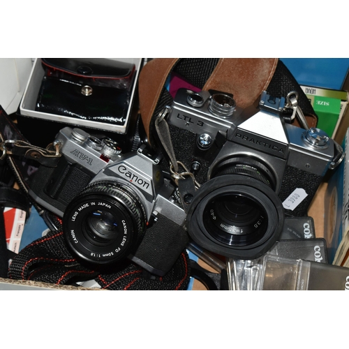 353 - A BOX OF CAMERAS AND ACCESSORIES to include a boxed Cinerex Auto Sound, Praktica LTL 3, a Canon AV-1... 