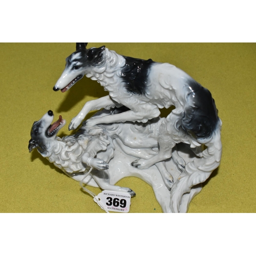 369 - A ROSENTHAL PORCELAIN PAIR OF RUSSIAN BORZOI  DOGS AT PLAY, green backstamp, height 14.5cm x width 1... 