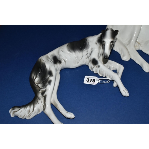 375 - TWO GERMAN PORCELAIN MODELS OF RECUMBANT BORZOI, one has a green Unterweissbach porcelain backstamp,... 