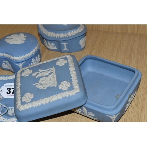 378 - FIVE PIECES OF WEDGWOOD PALE BLUE JASPERWARE, comprising a boxed Leo pin dish, a club shaped pin dis... 