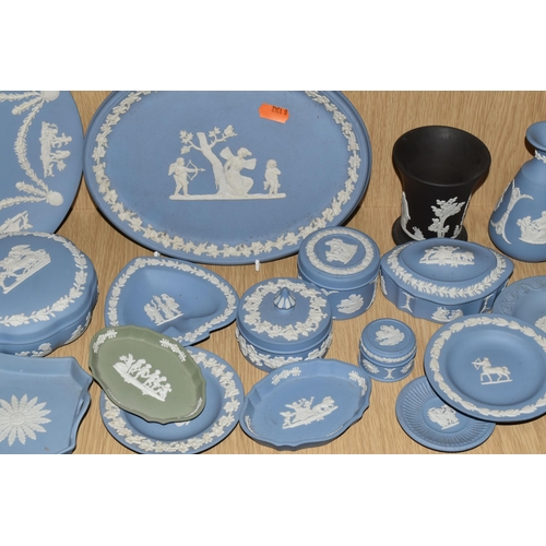 381 - A QUANTITY OF WEDGWOOD BLUE JASPERWARE, comprising an oval plaque, cabinet plate, eight trinket dish... 