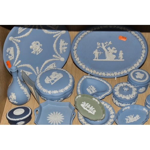 381 - A QUANTITY OF WEDGWOOD BLUE JASPERWARE, comprising an oval plaque, cabinet plate, eight trinket dish... 