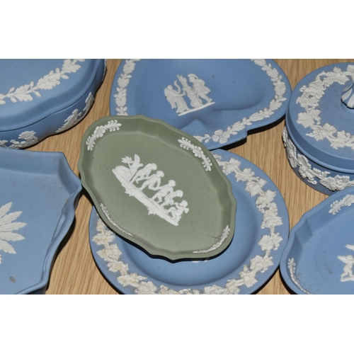 381 - A QUANTITY OF WEDGWOOD BLUE JASPERWARE, comprising an oval plaque, cabinet plate, eight trinket dish... 