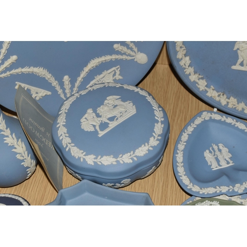 381 - A QUANTITY OF WEDGWOOD BLUE JASPERWARE, comprising an oval plaque, cabinet plate, eight trinket dish... 