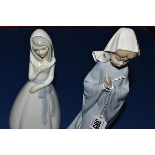 385 - A GROUP OF LLADRO, NAO AND SIMILAR SPANISH PORCELAIN FIGURES, comprising Lladro Angel Praying no 453... 