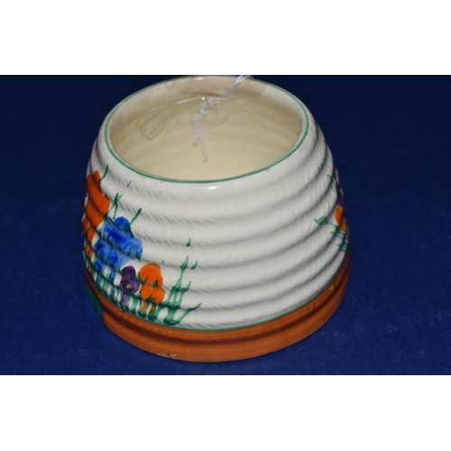 388 - A CLARICE CLIFF 'CROCUS' HONEYPOT BASE, painted with orange, blue and purple crocus flowers on a cre... 