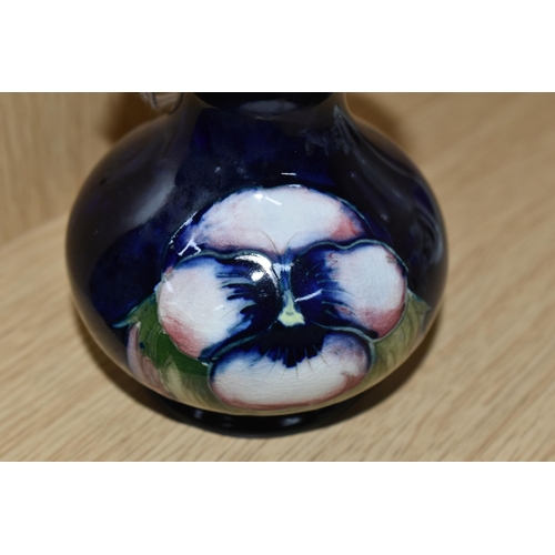 395 - A MOORCROFT POTTERY SMALL 'PANSY' PATTERN VASE, with flared neck, tube lined with purple pansies on ... 