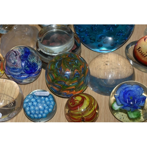 396 - A LARGE QUANTITY OF GLASS PAPERWEIGHTS, comprising a pink Caithness Glass bud vase and perfume atomi... 