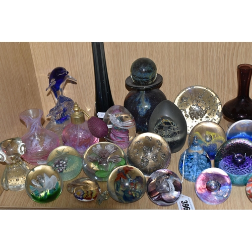 396 - A LARGE QUANTITY OF GLASS PAPERWEIGHTS, comprising a pink Caithness Glass bud vase and perfume atomi... 