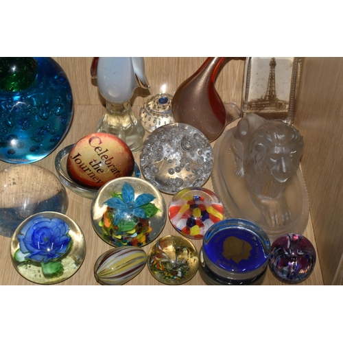 396 - A LARGE QUANTITY OF GLASS PAPERWEIGHTS, comprising a pink Caithness Glass bud vase and perfume atomi... 