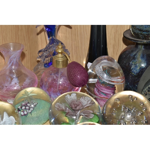 396 - A LARGE QUANTITY OF GLASS PAPERWEIGHTS, comprising a pink Caithness Glass bud vase and perfume atomi... 