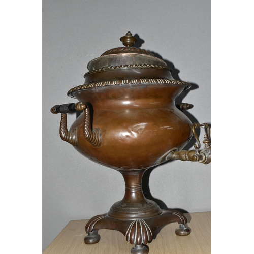 408 - A NINETEENTH CENTURY COPPER SAMOVAR, with cover, two scrolling handles with wooden insulators, metal... 